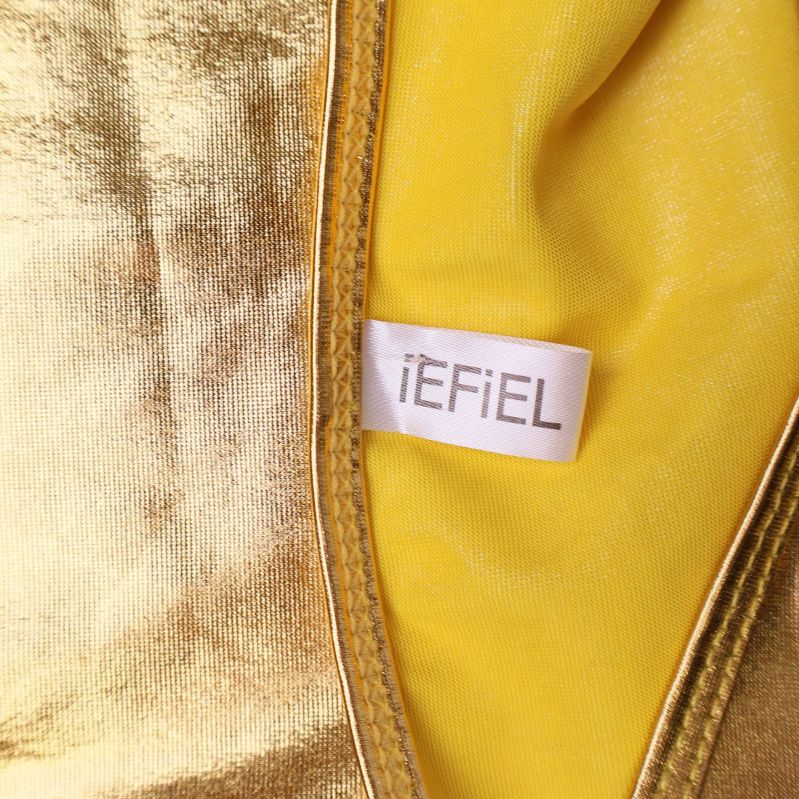 Vit etikett med texten iEFiEL på gul insida