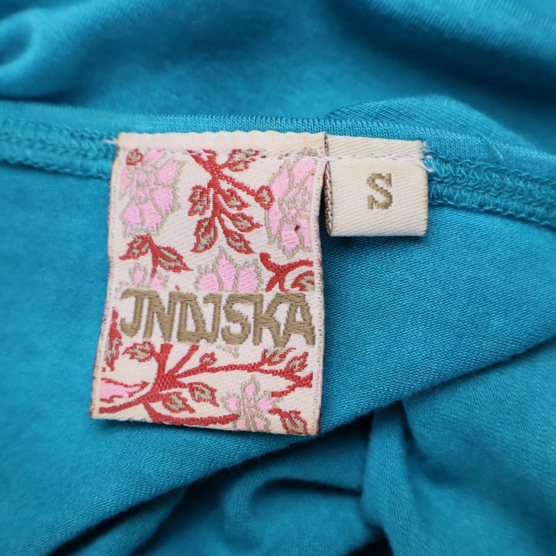 Indiska varumärkestagg och storlek S på etikett