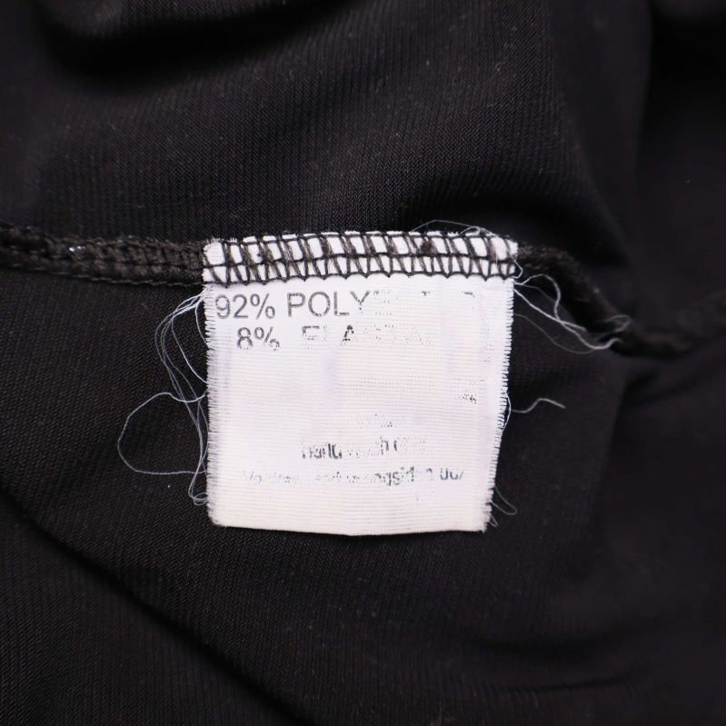 Materiallapp med information om polyester och elastan