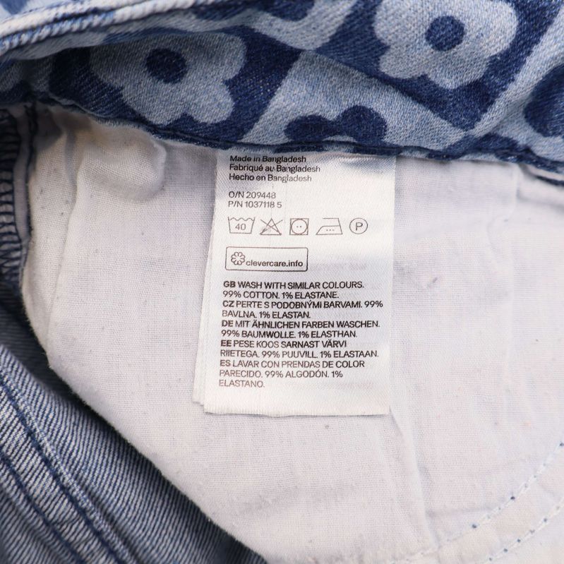 Materiallapp visar sammansättning bomull och elastan