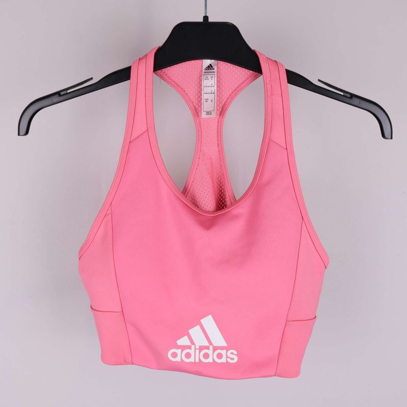 Rosa tränings-bh med vit Adidas-logga framtill och meshpanel