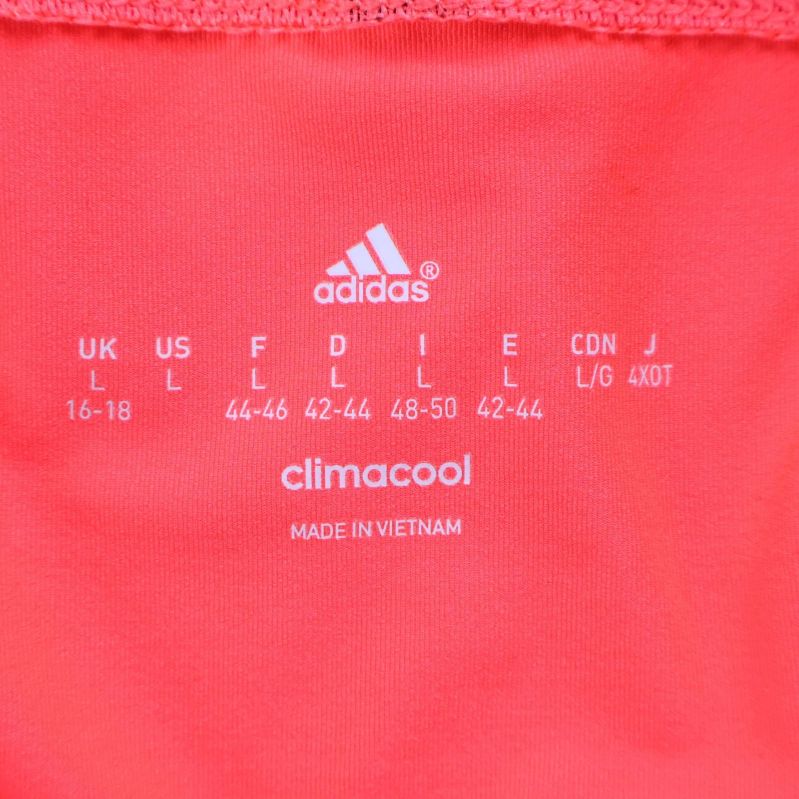 Storleksetikett med Adidaslogga och Climacool-tryck