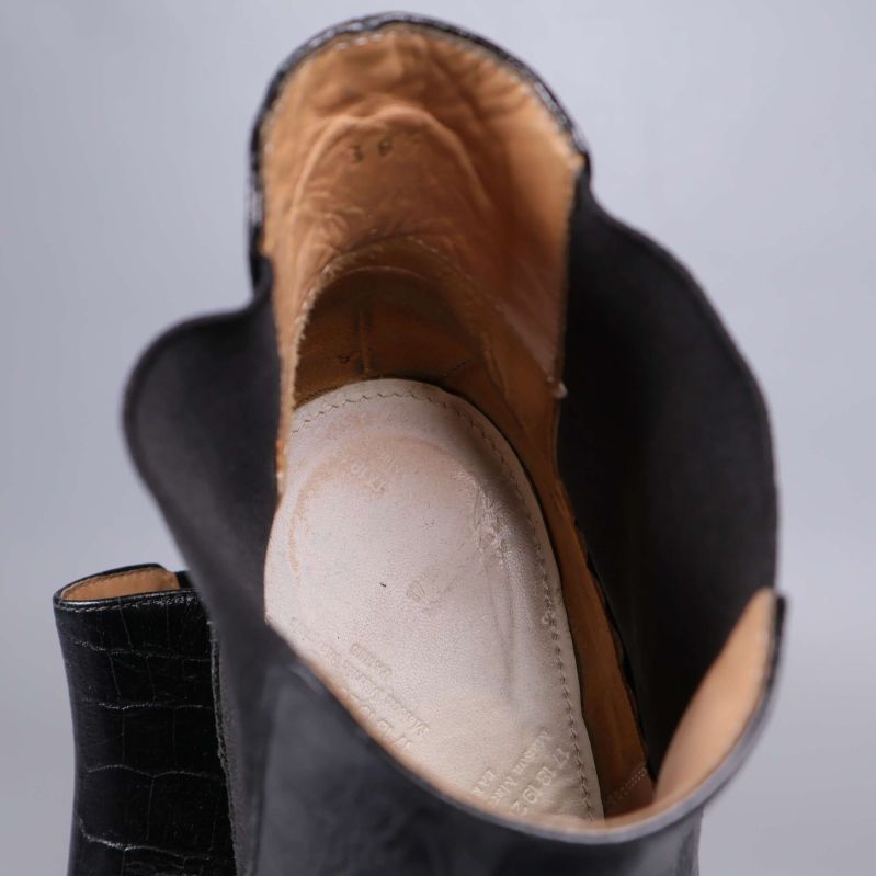 Insidan av boots visar märkning