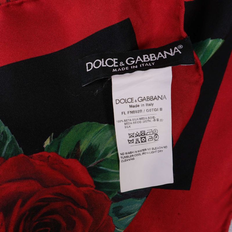 Materiallapp visar Dolce & Gabbana och 100% siden