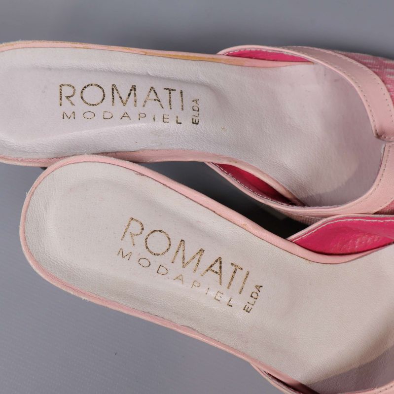 Innersula med texten ROMATI MODAPIEL ELDA