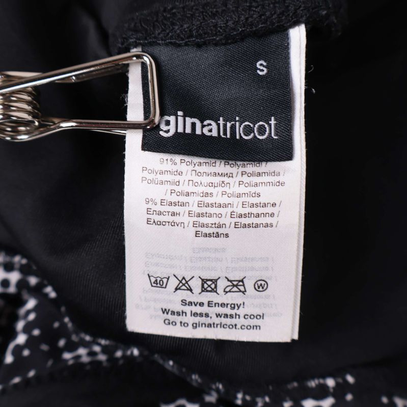 Materiallapp från ginatricot visar material och tvättråd