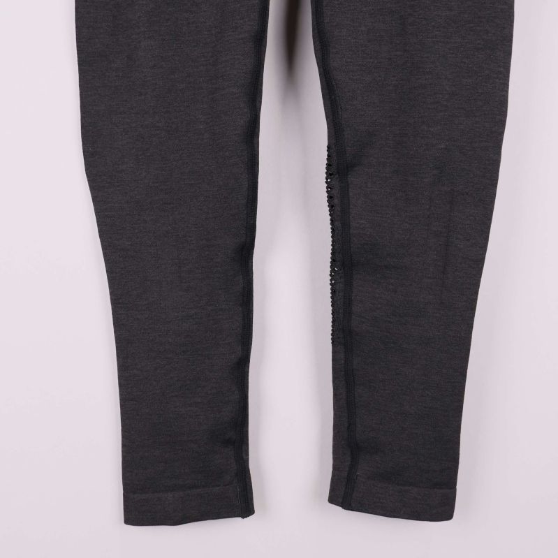 Nedre delen av benen på träningstights