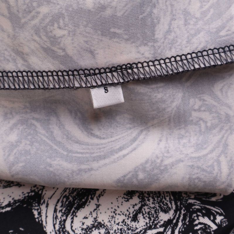 Storleksetikett med märkning S på insidan