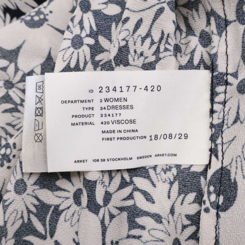 Material- och produktetikett som visar 100% viskos