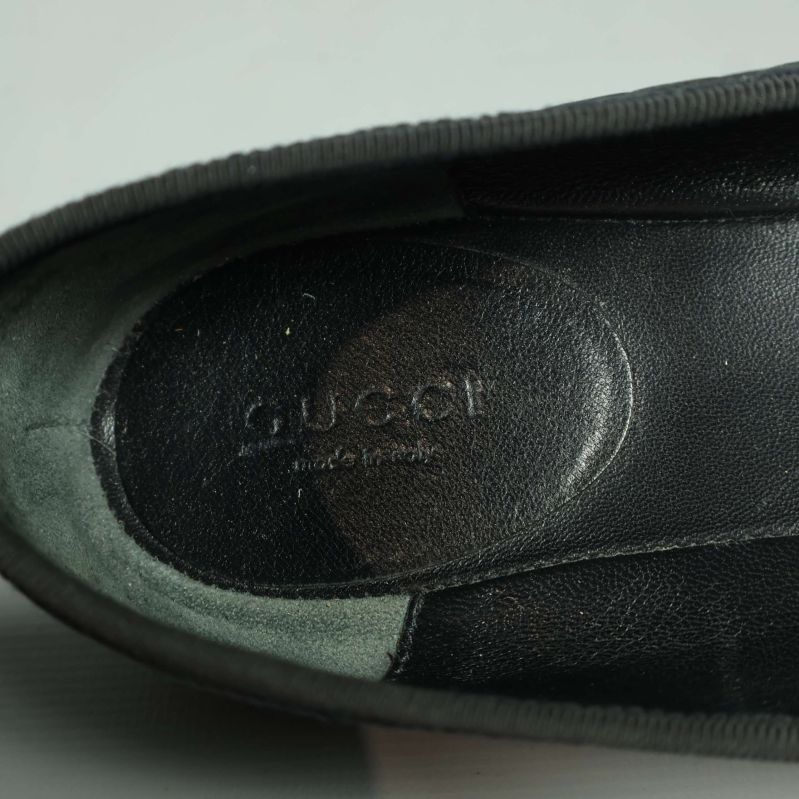 Gucci-stämpel och Made in Italy i sko
