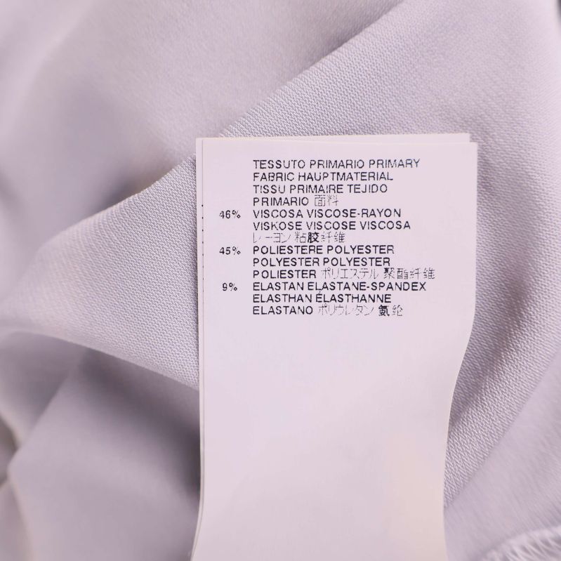 Materialkomposition visas: 48% viskos, 45% polyester, 7% elastan