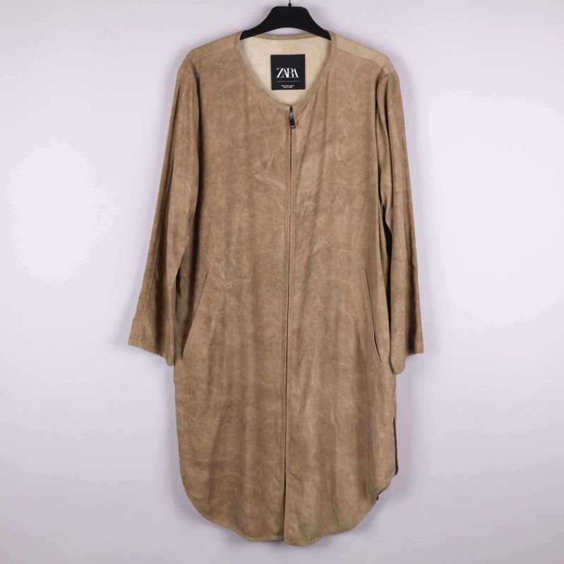 Beige kappa framsida