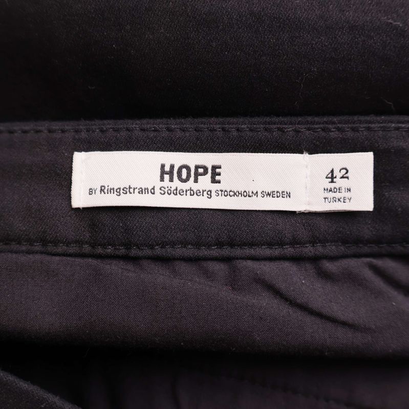 Etikett visar HOPE och storlek 42