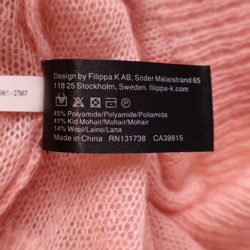 Materiallapp visar materialblandning av polyamid, mohair och ull