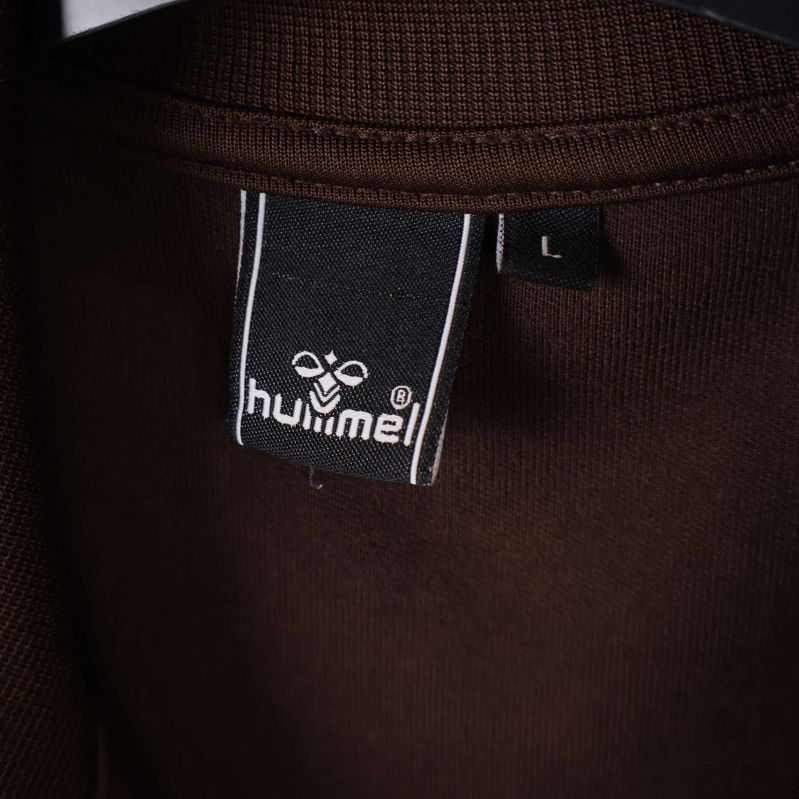 Storleksetikett med hummel-logo och storlek L