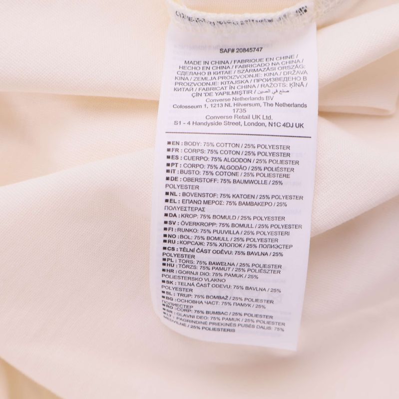 Materiallapp som visar 75% bomull och 25% polyester