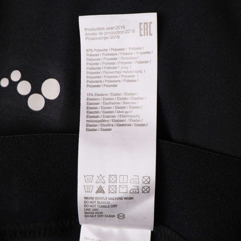 Detaljerad materialbeskrivning med procent polyester och elastan