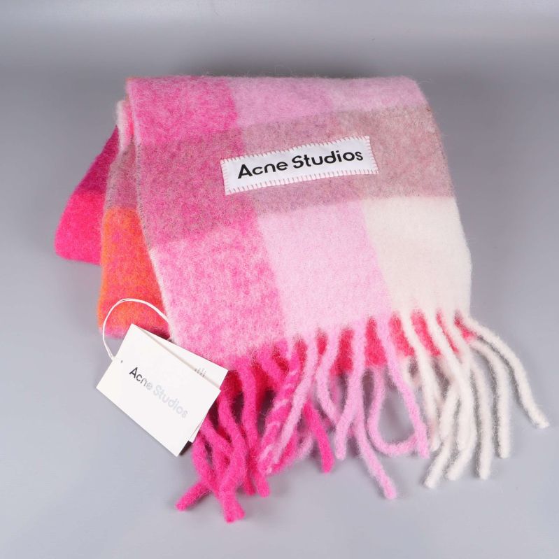 Rutig halsduk i rosa och orange med fransar och Acne Studios-märke