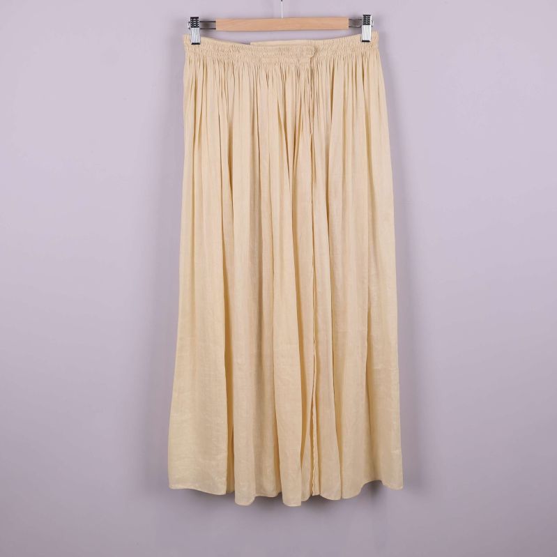 Lång gul kjol med plissering och resår i midja