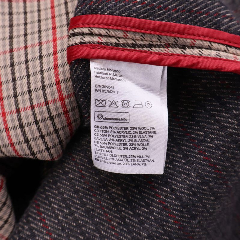 Materiallapp visar materialblandning för kappan