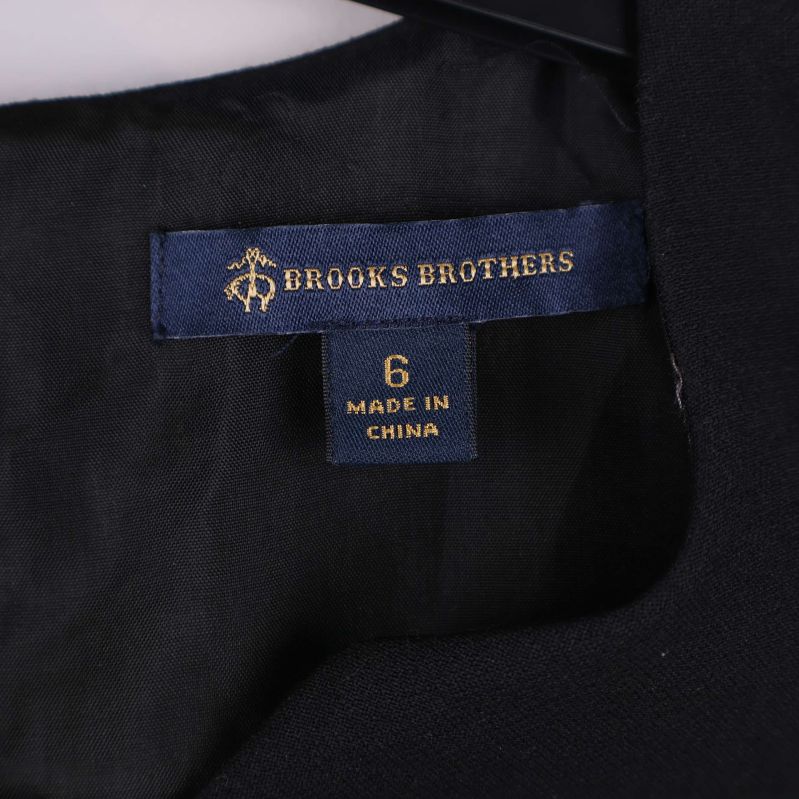 Brooks Brothers etikett i blått med storlek 6