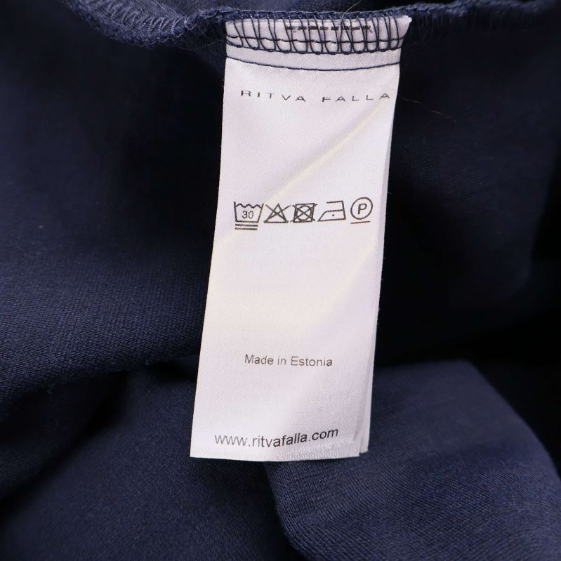 Vård- och tillverkningsetikett från Ritva Falla