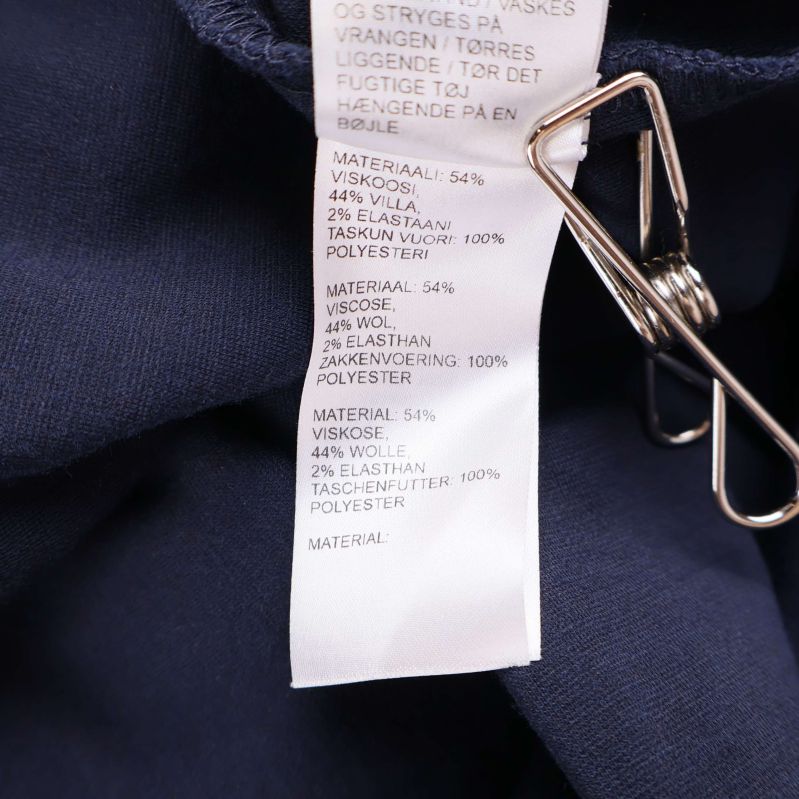 Materialetikett med detaljerade materialprocenter