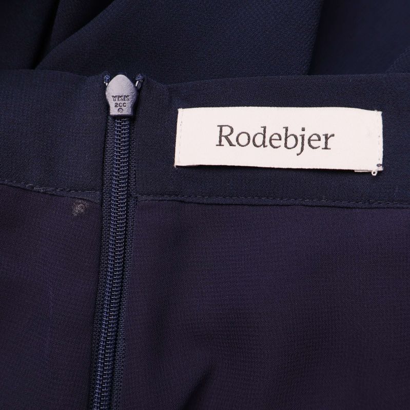 Rodebjer etikett på insidan av midjan