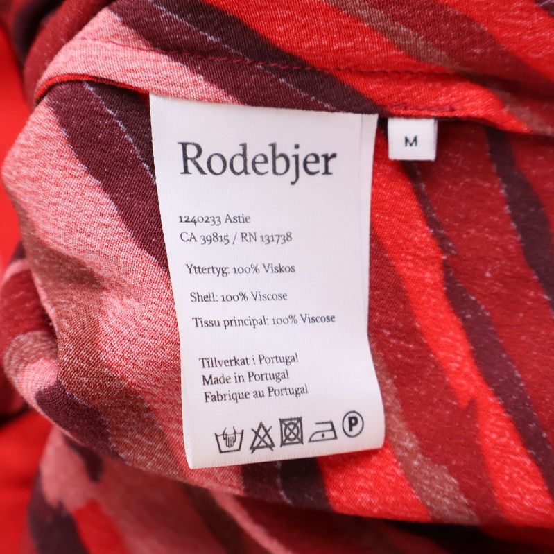 Materiallapp som visar 100% viskos och tvättråd