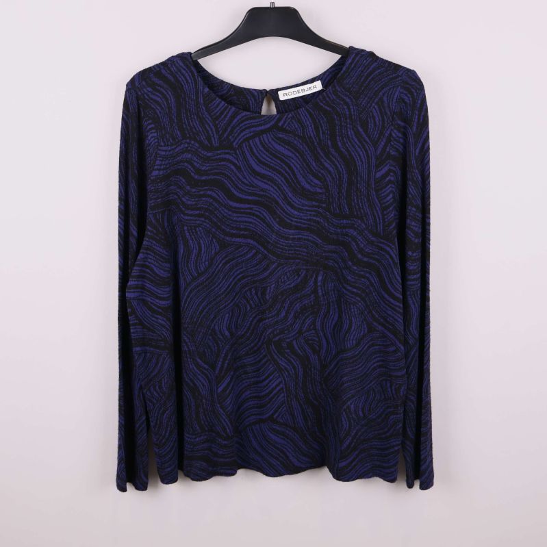 Långärmad blåsvart topp med rund hals och mönster