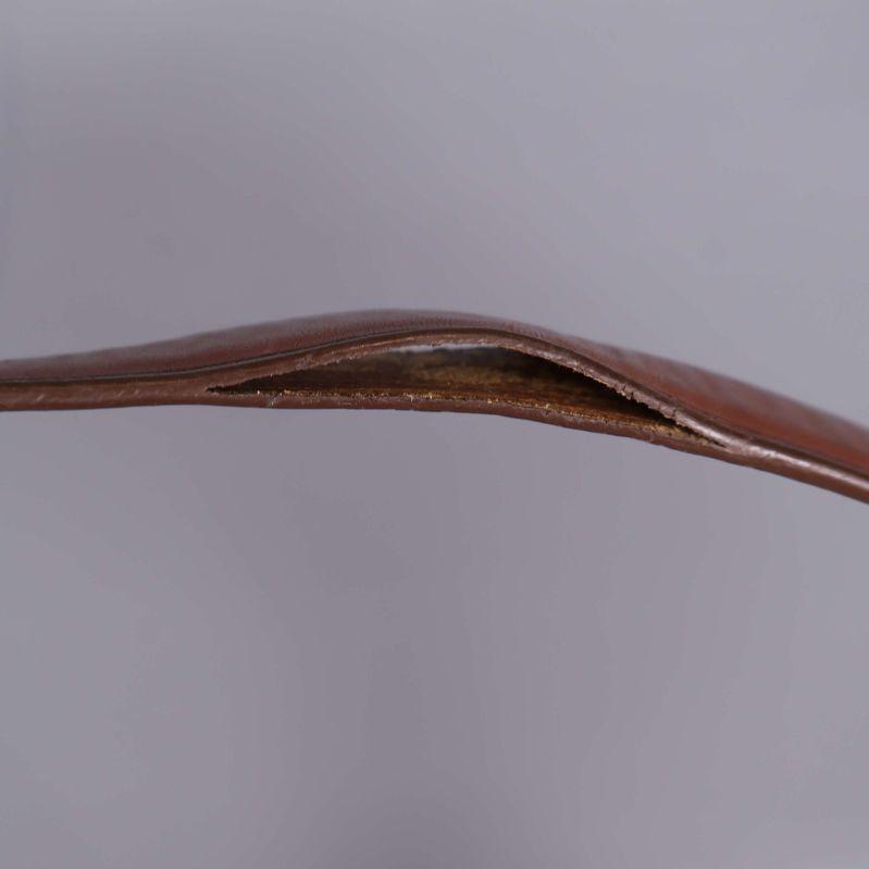 Släppt i söm på rem