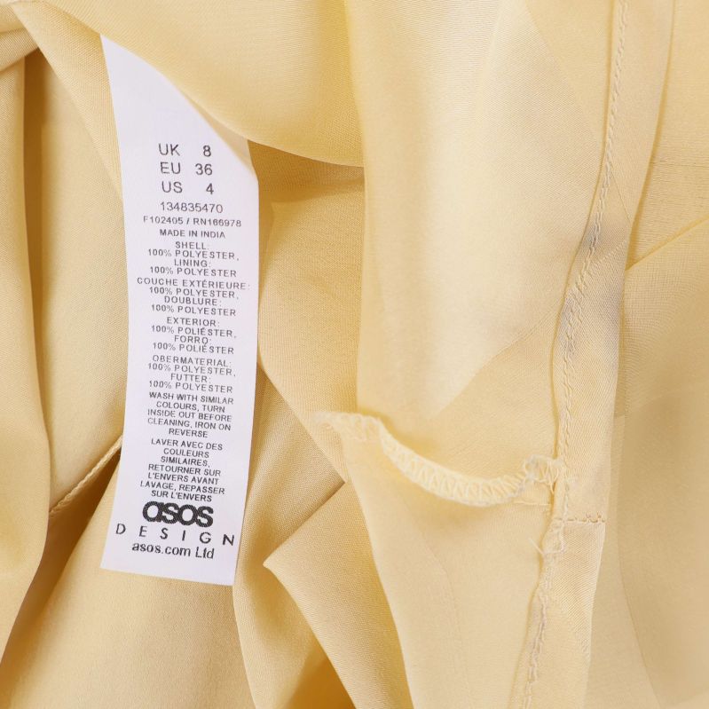 Tvättrådsetikett med storlek EU 36 och materialinformation