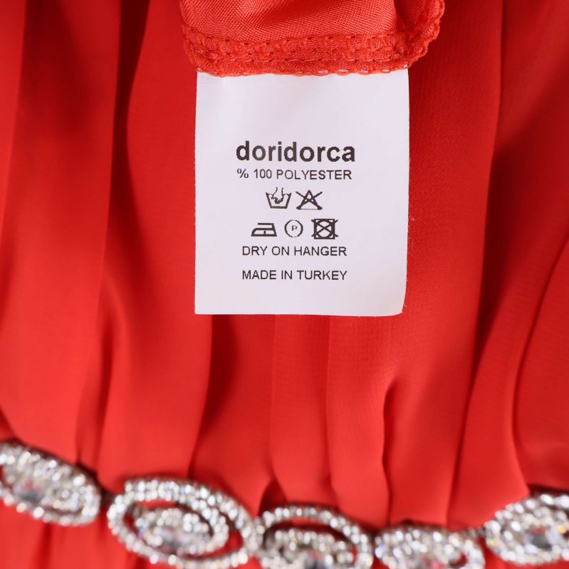 Materiallapp i röd klänning doridorca 100% polyester