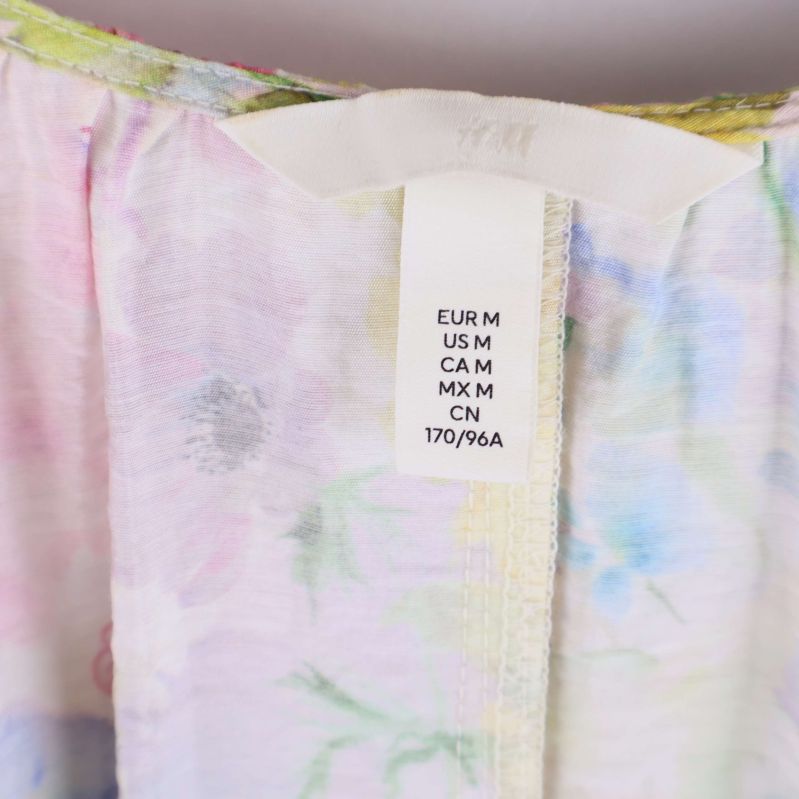 Storleksetikett med information om mediumstorlek