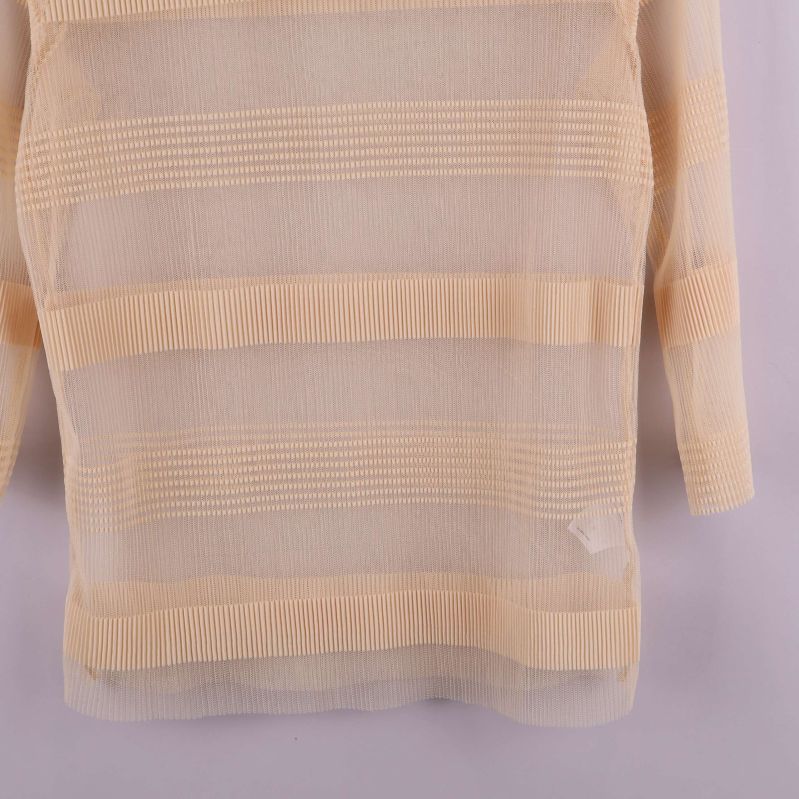 Nederdel på beige transparent randig meshtröja