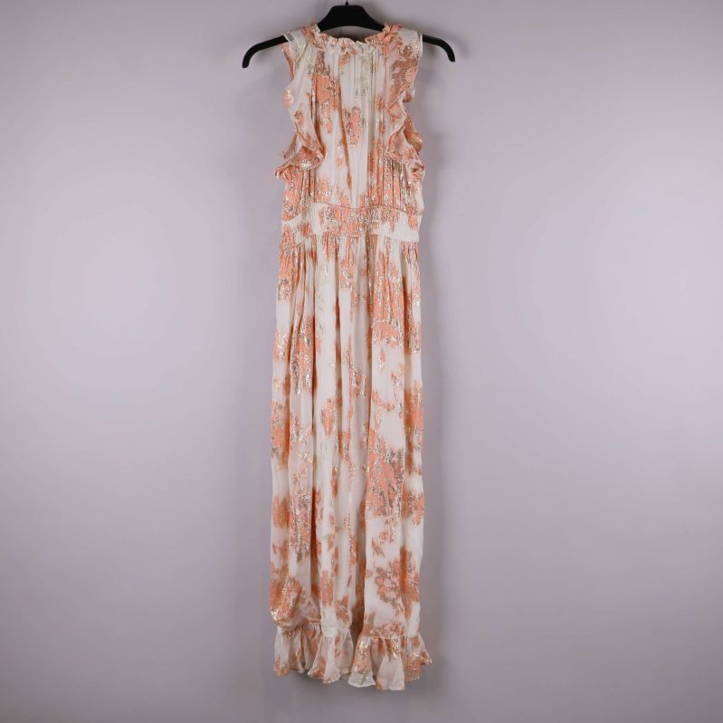 Klänningen bakifrån med volanger och blommigt mönster