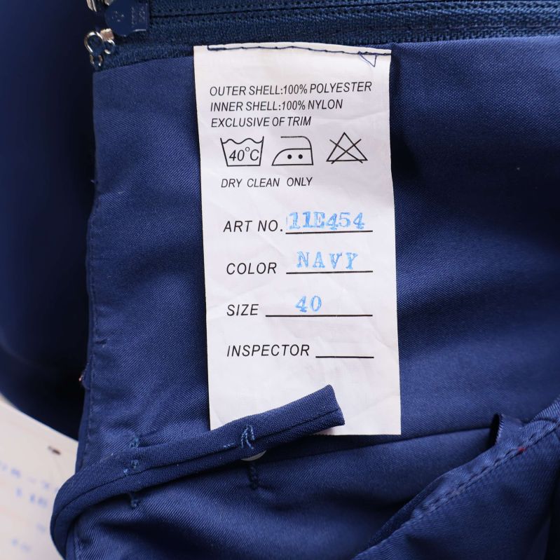 Materiallapp anger polyester och nylon samt tvättråd