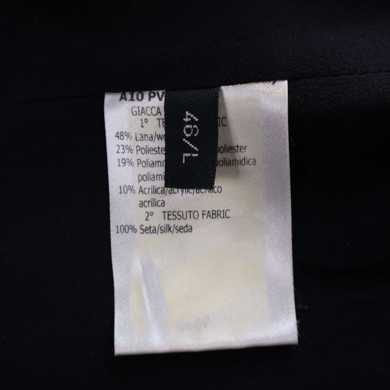 Materialetikett med detaljer om sammansättning