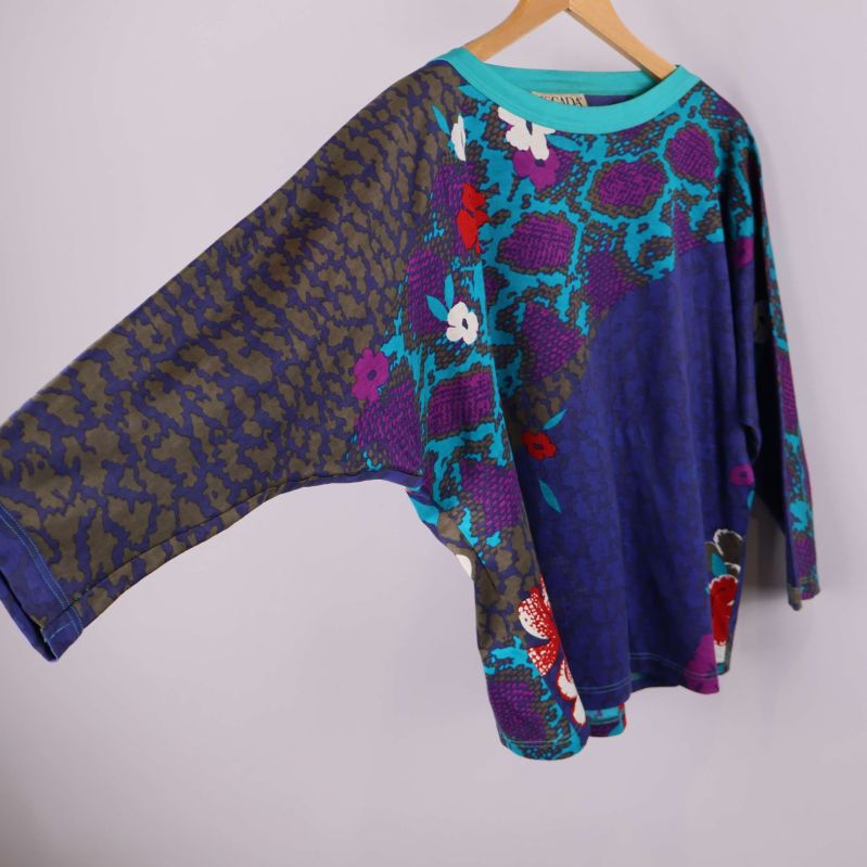 Tröja med vid ärm i fokus och mönstrad detalj