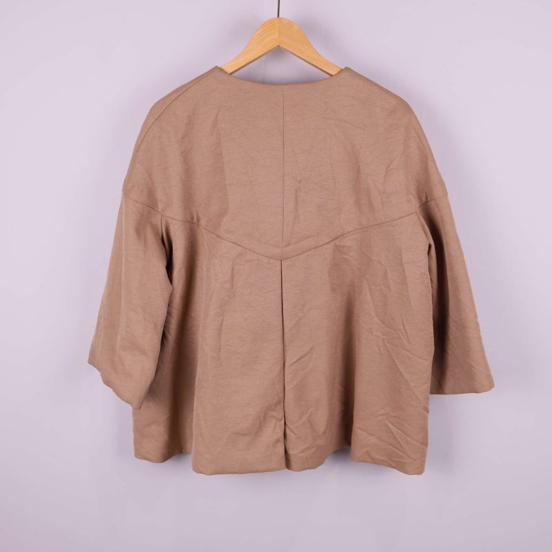 Jackans baksida i beige 