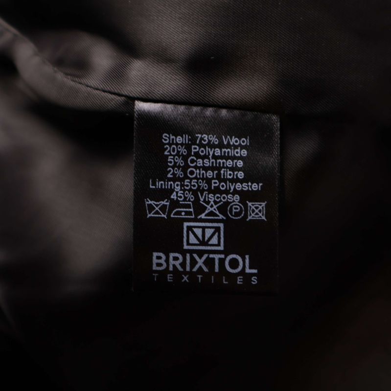 Materiallapp med information om ull, polyamid och kashmir