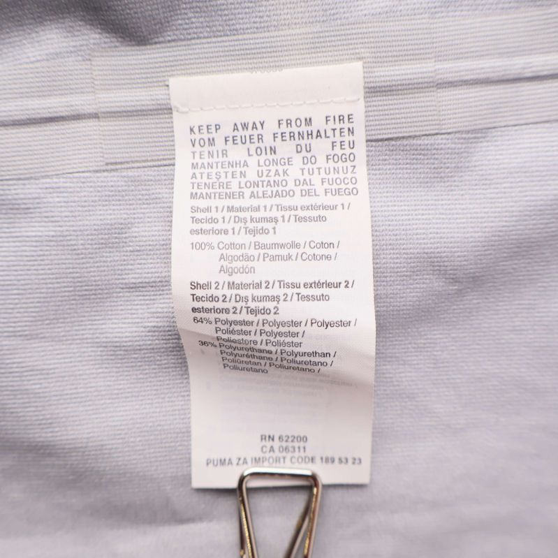 Textiletikett med materialinformation på insidan av jackan