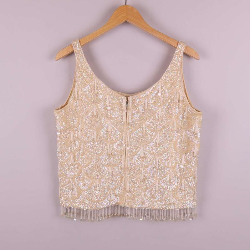 Paljettlinne med fransar, baksida