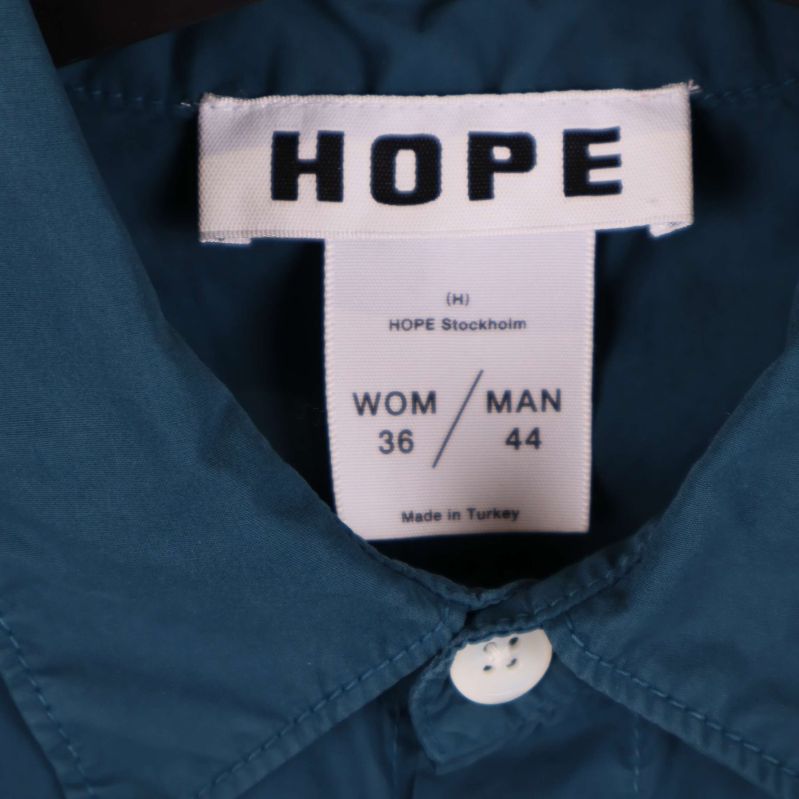 Närbild på HOPE-märke och storleksinformation