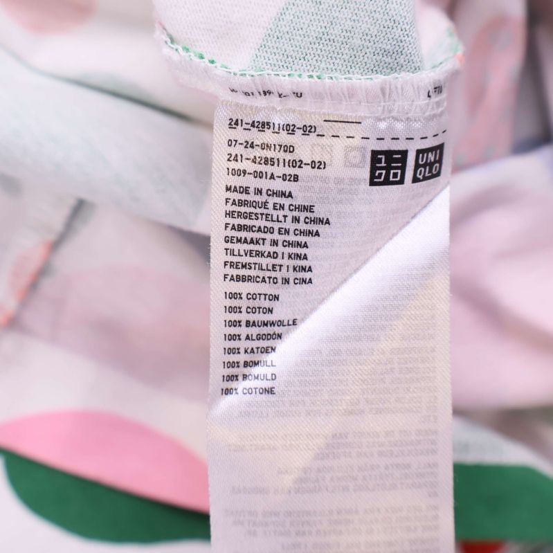 Materiallapp visar 100% bomull