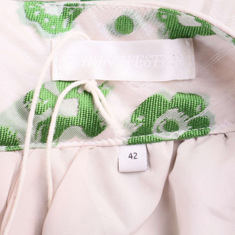 Storlekslapp och inneretikett på kjol, storlek 42