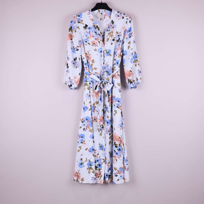 Blommig midiklänning upphängd med knytskärp och långa ärmar