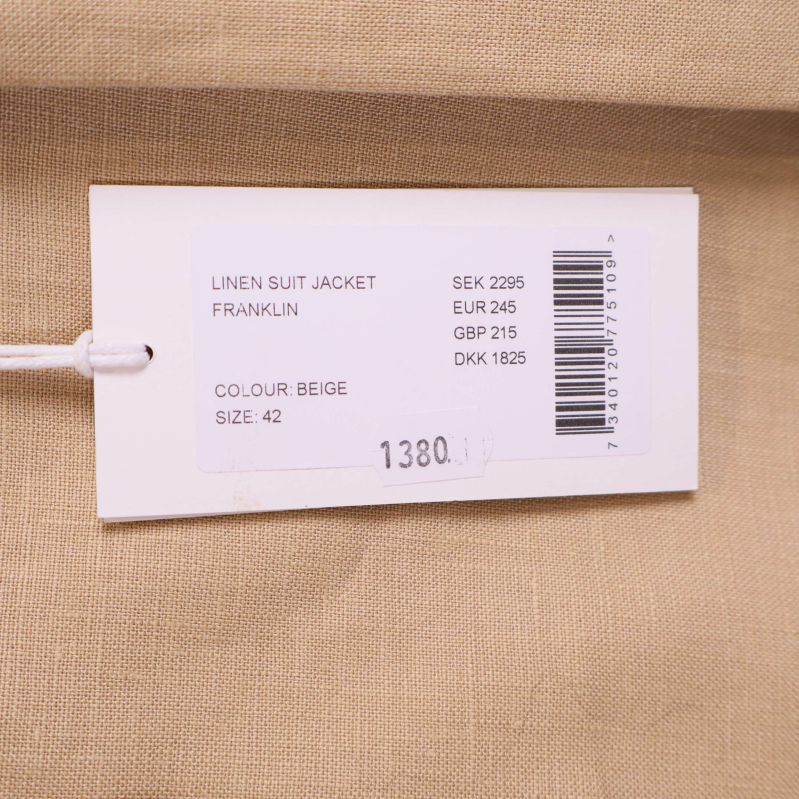 Produktetikett med information om färg, storlek och pris