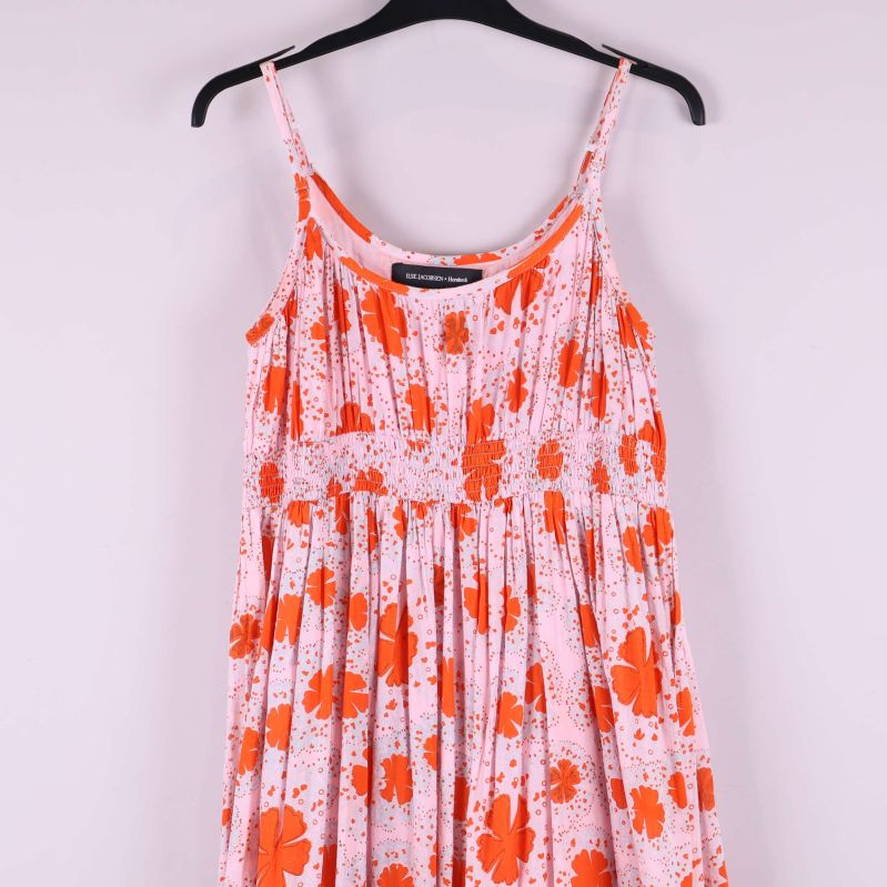 Övre del av blommig klänning med smala axelband