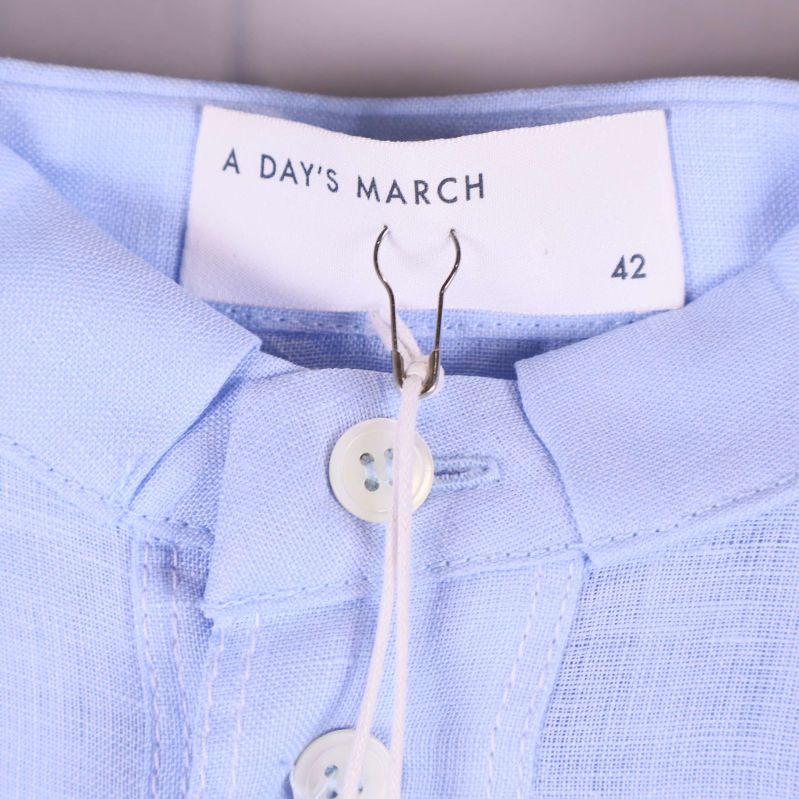 Halsringning och märkesskylt med storlek 42